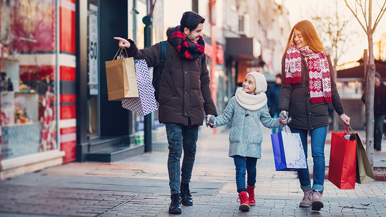 family shopping at an outdoor mall