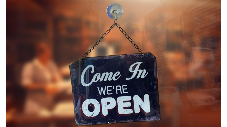 Open sign in store window