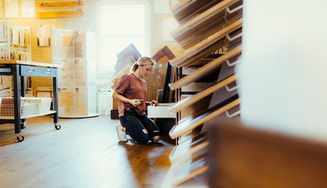 Interior designer looking at flooring samples